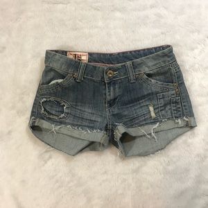 Distressed denim shorts